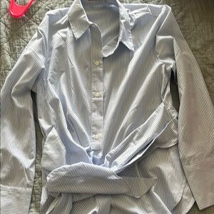 Abercrombie size medium work shirt. Buttons and ties in the front